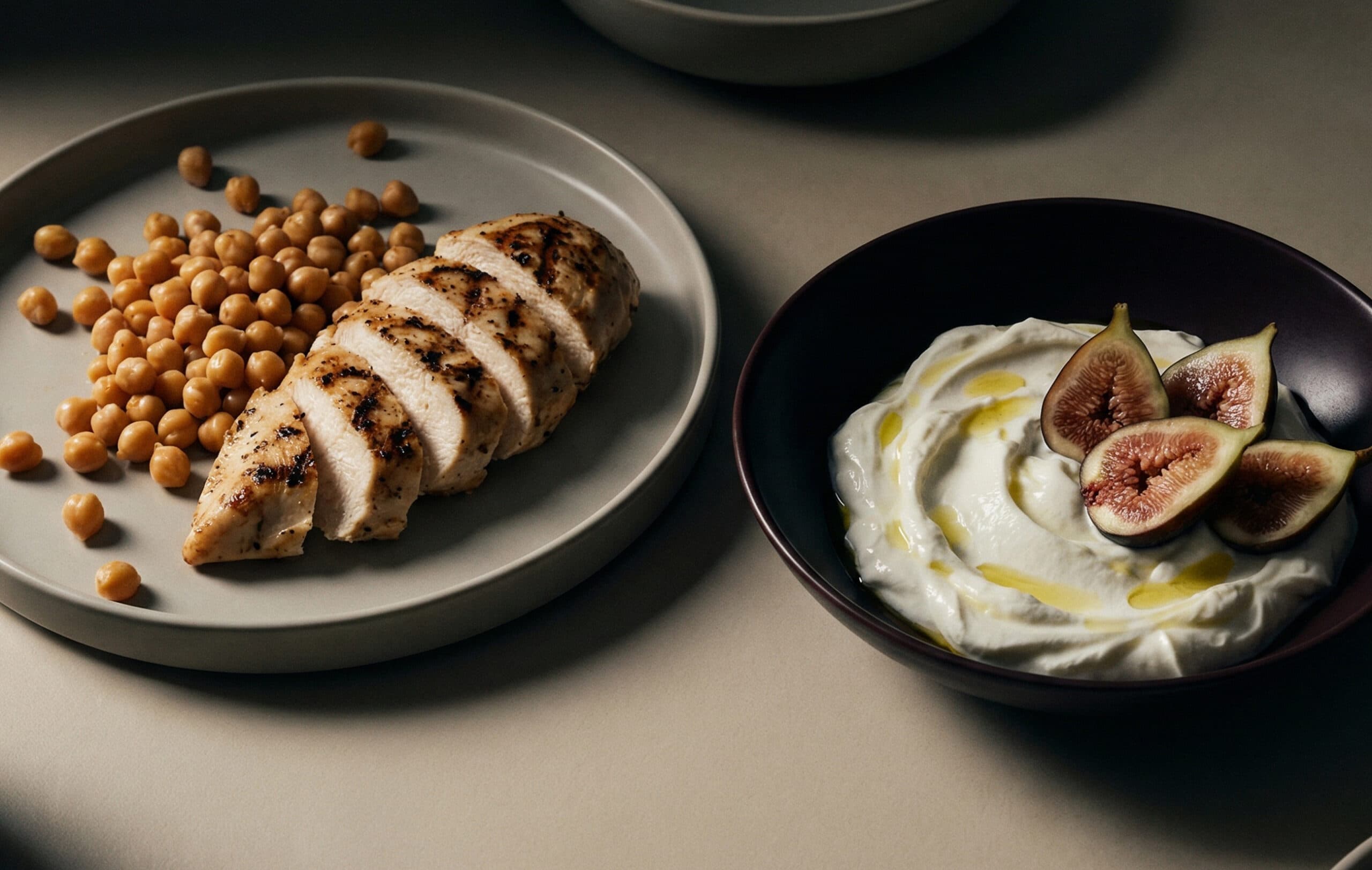 A photo of a meal containing Chicken and Hummus